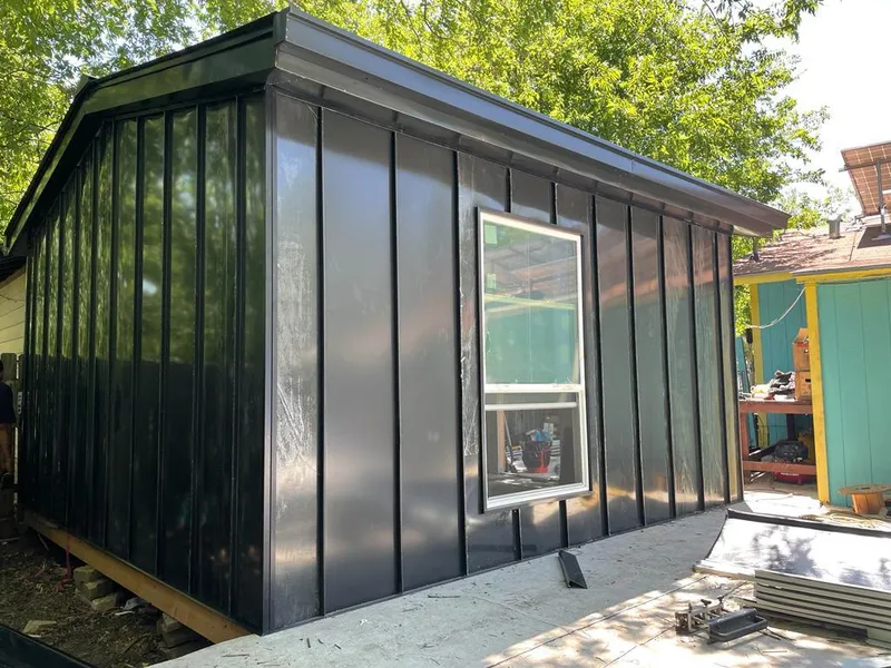 Black standing seam metal wall panels for Roof Inspection in Clarksburg