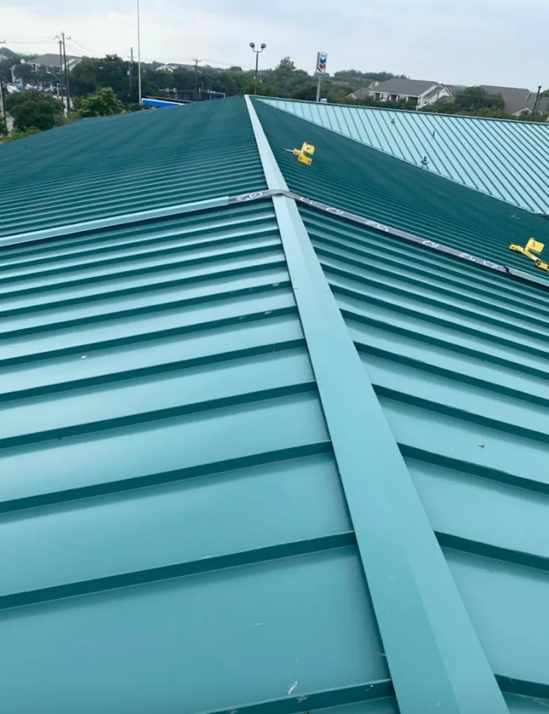 Green commercial metal roof ridge and valley for Metal Roof Repair in Clarksburg
